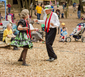 Man and woman dancing on sawdust at Jazz Blues Festival