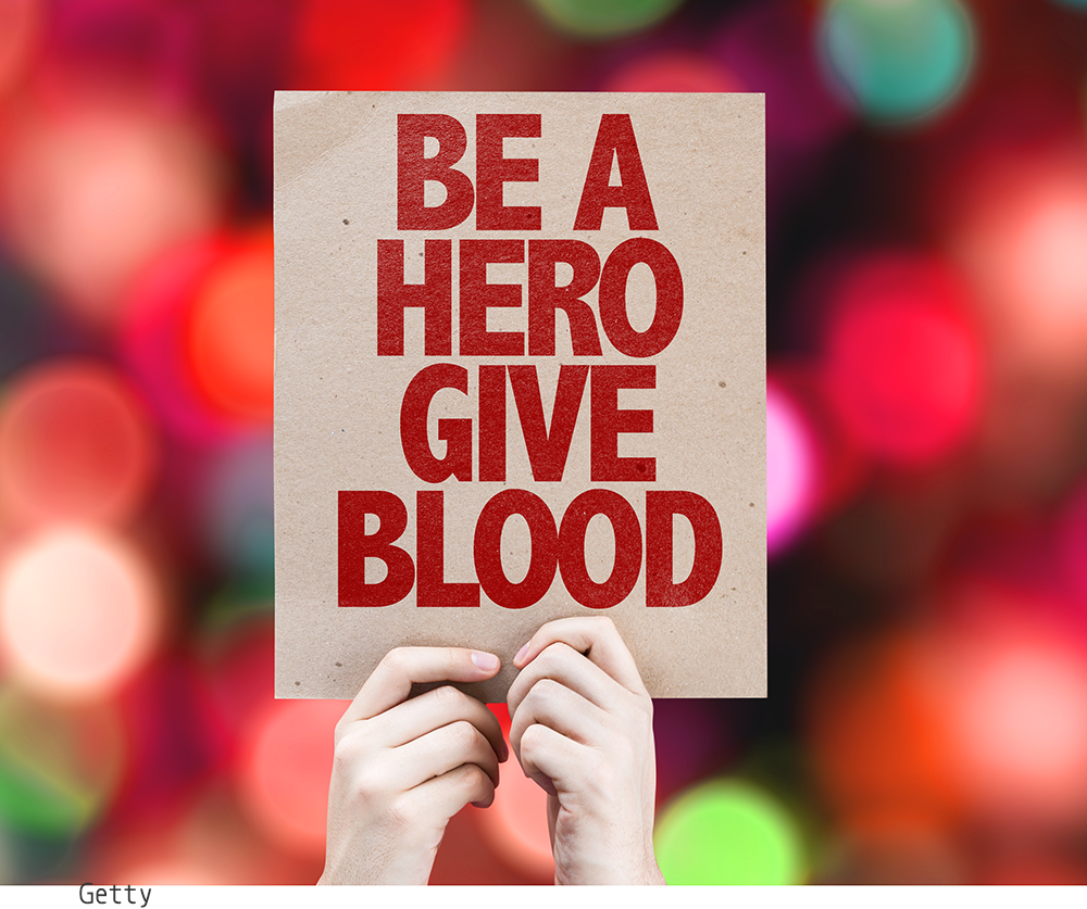 Be a Hero, Give Blood signage